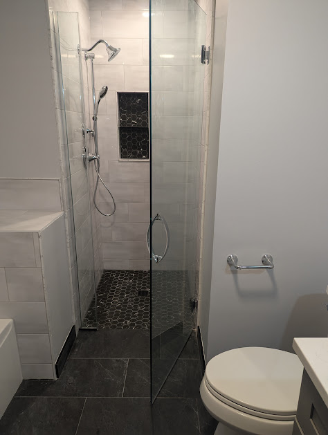 Walk-in shower tile bathroom renovation